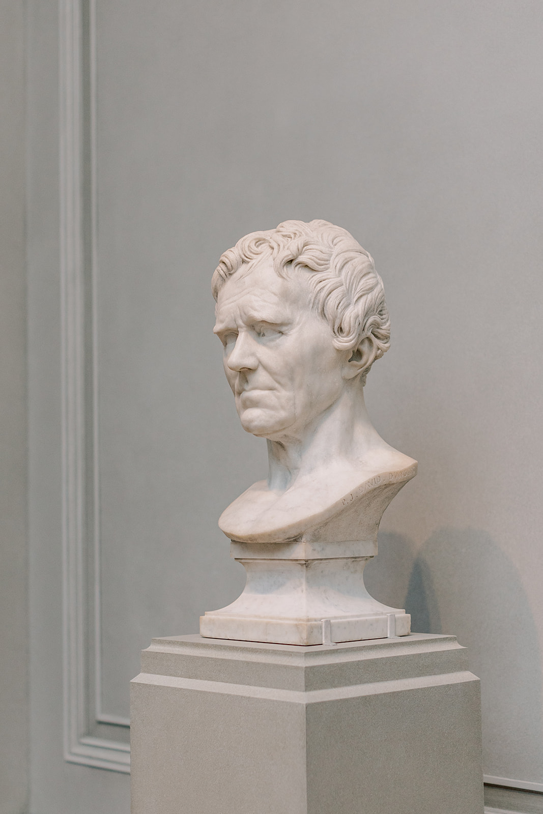 Marble statue at the National Gallery of Art, one of the best engagement photo locations in DC.
