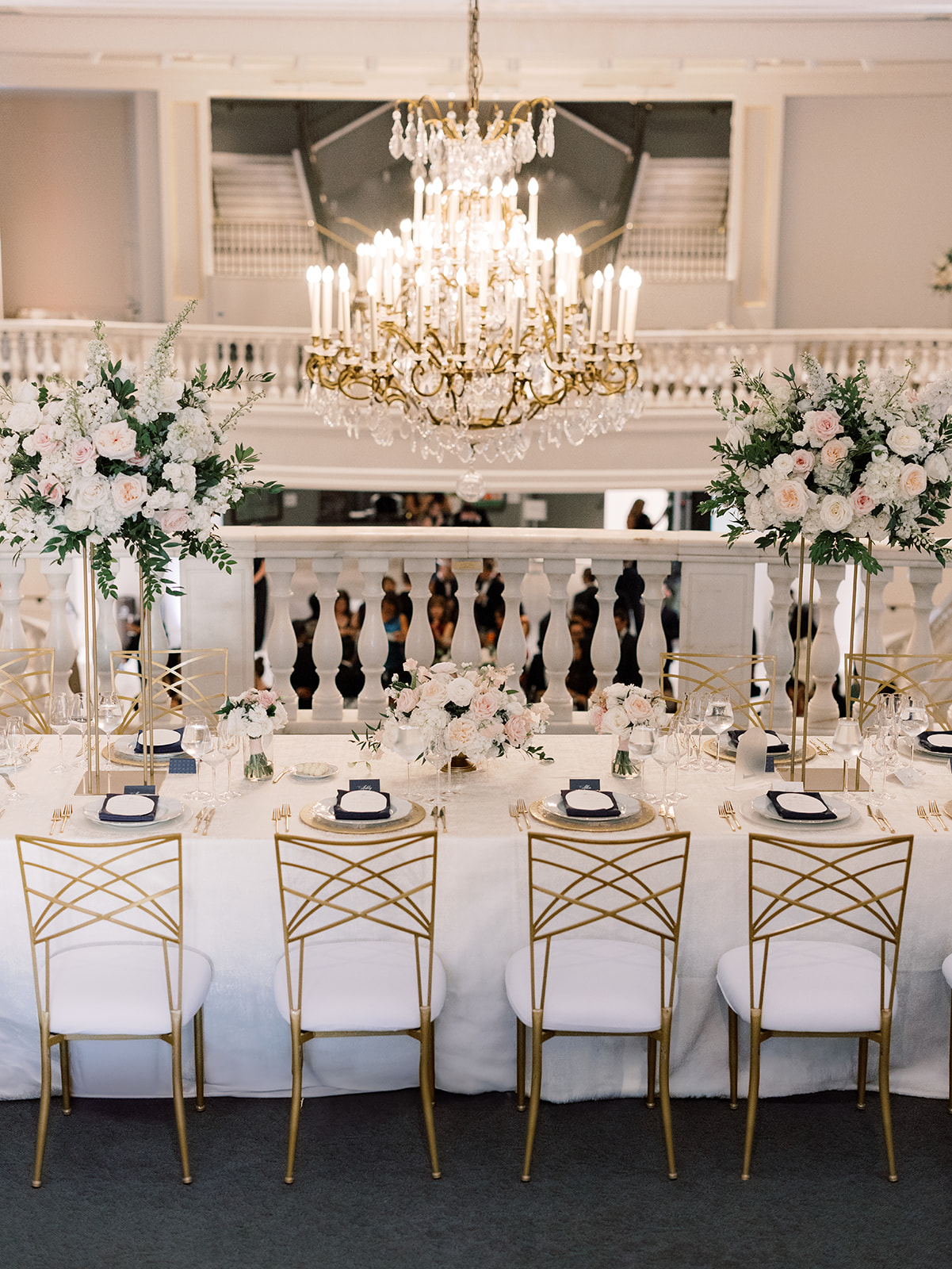 Interior reception table setup at a wedding at the National Museum of Women in the Arts (NMWA) in Washington DC.